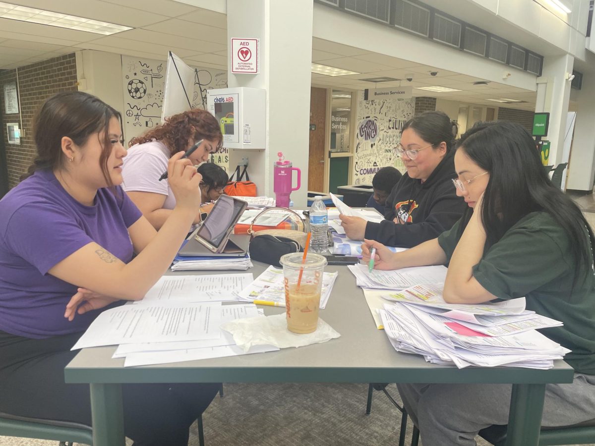 PSC students study in the atrium: Esme Canchola, Diana, Wirny Rodriguez, Angelica Ledezma, Randie Sanchez, Henry Mengalle

